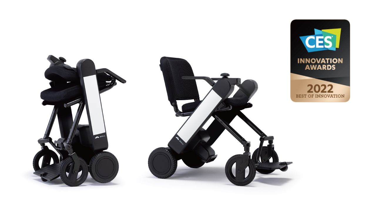 Model F power chair mobility device shown in folded and open positions, beside a CES 2022 Innovation Award badge, highlighting modern design.